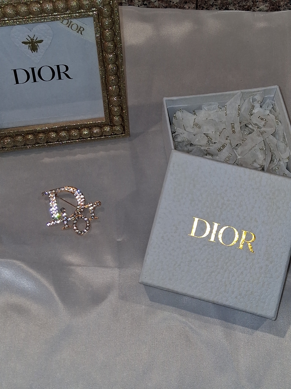 Designer inspired Crystal Logo Brooch Comes With Box.(Frame Is not included)